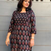 Black ajrakh kurti with yoke highlighted in hand-embroidery