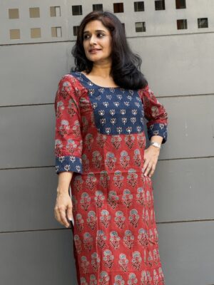 Red ajrakh kurta with contrast blue yoke in hand-embroidery for festive season