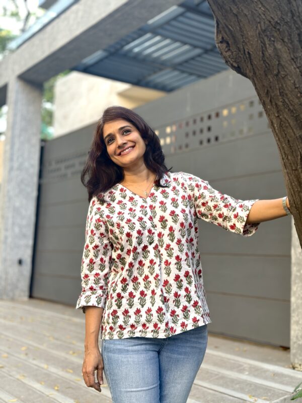 White floral printed top with sleeves with details